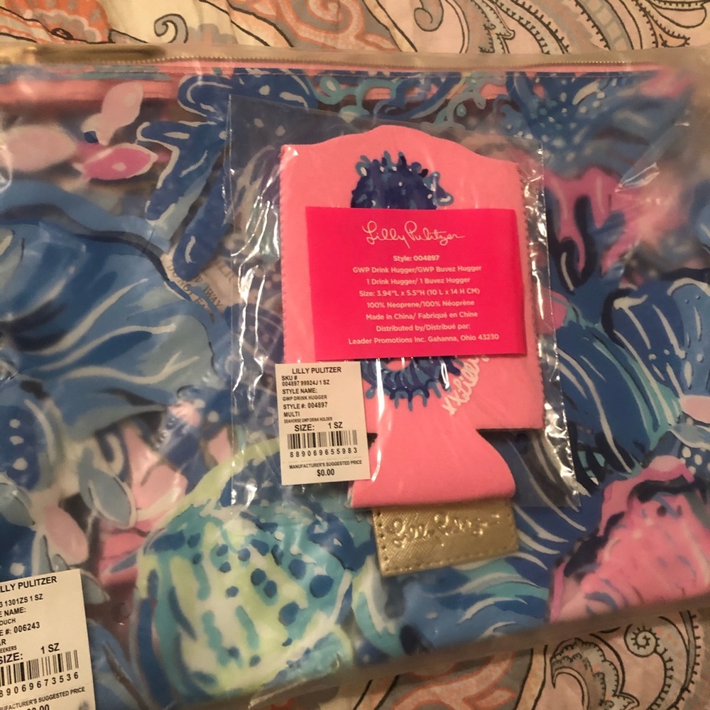 NIB Cosmetic pouch and Koozie